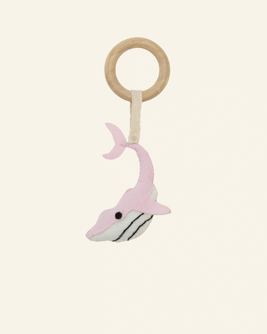 Bubbles handcrafted pink whale baby hanging toy with a natural wooden ring, designed for cots, prams, strollers, sensory play, and elegant nursery décor.