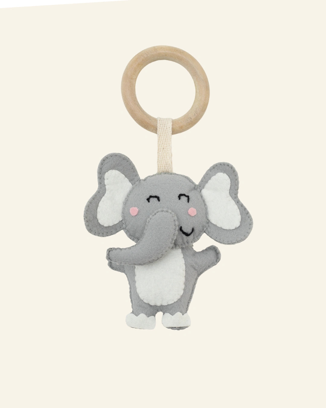 Handmade Elio elephant felt baby teether ring by TAVI Nest featuring a soft grey elephant attached to a natural wooden ring for safe teething and sensory development.