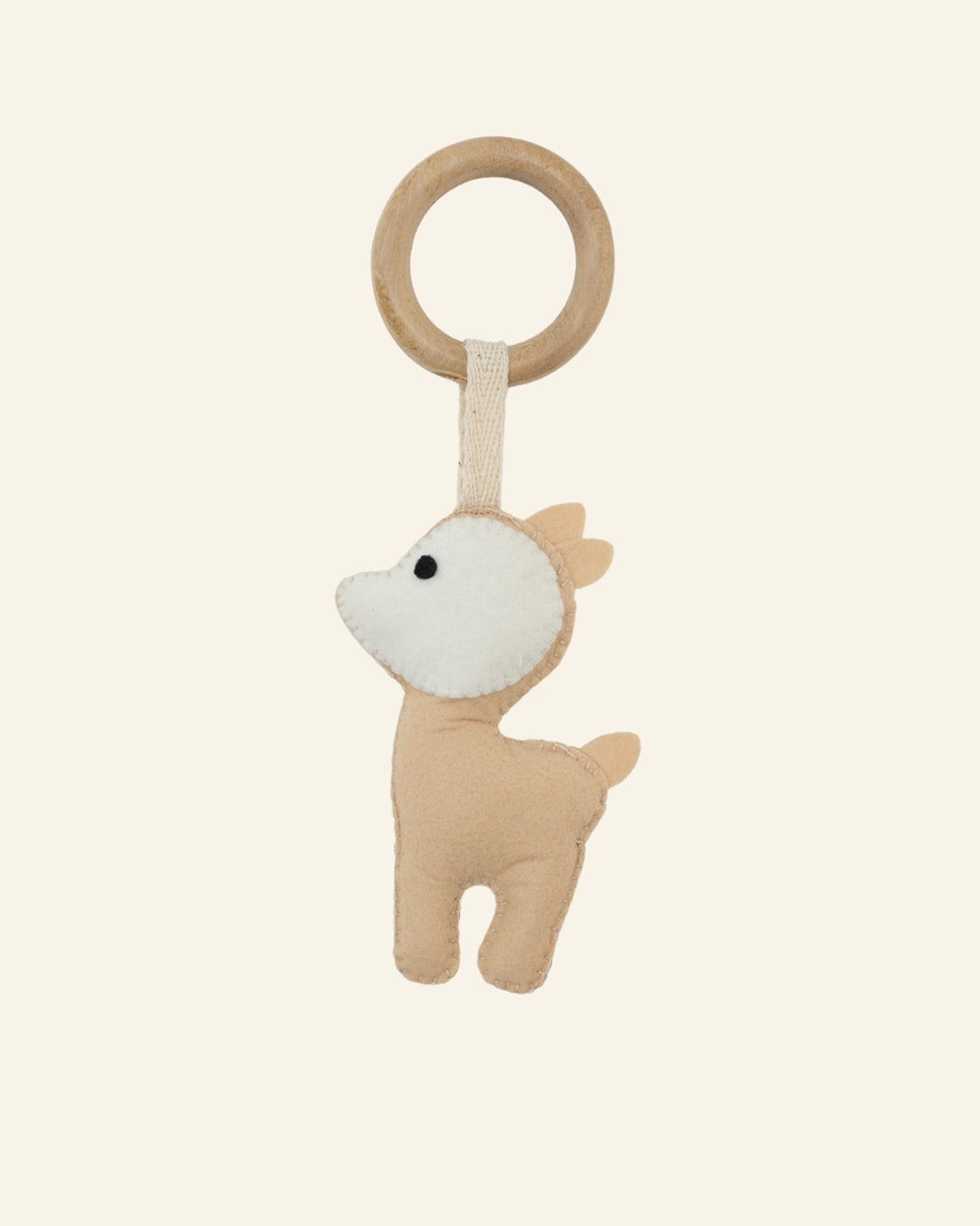 Handmade Tiny Fawn felt baby teether ring by TAVI Nest featuring a soft beige fawn attached to a smooth natural wooden ring, designed for newborn sensory play and little hands.